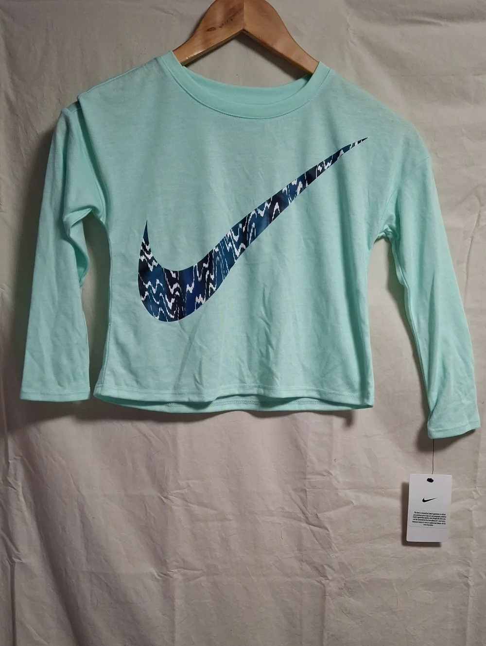 Nike Mint Green Long-Sleeve Tee with Navy Patterned Swoosh